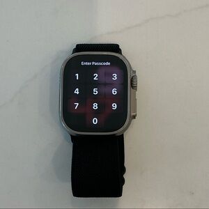 Apple Smartwatch with Black Band and Silver Case